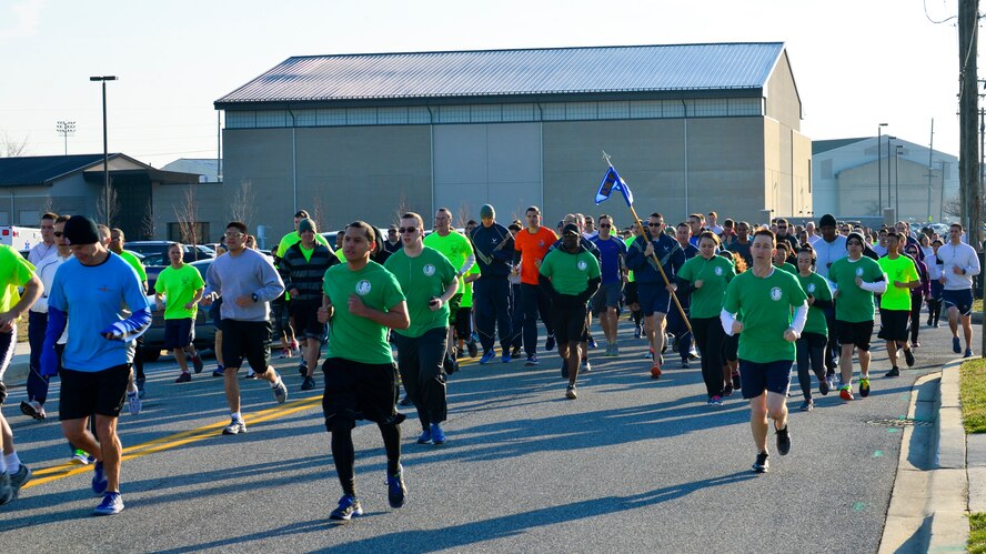 More than 450 Team Dover Airmen run in the Sexual Assault Prevention and Response 5 kilometer run/walk April 2, 2015, on Dover Air Force Base, Del. The race was held in recognition of Sexual Assault Awareness and Prevention month. (U.S. Air Force photo/Airman 1st Class William Johnson)