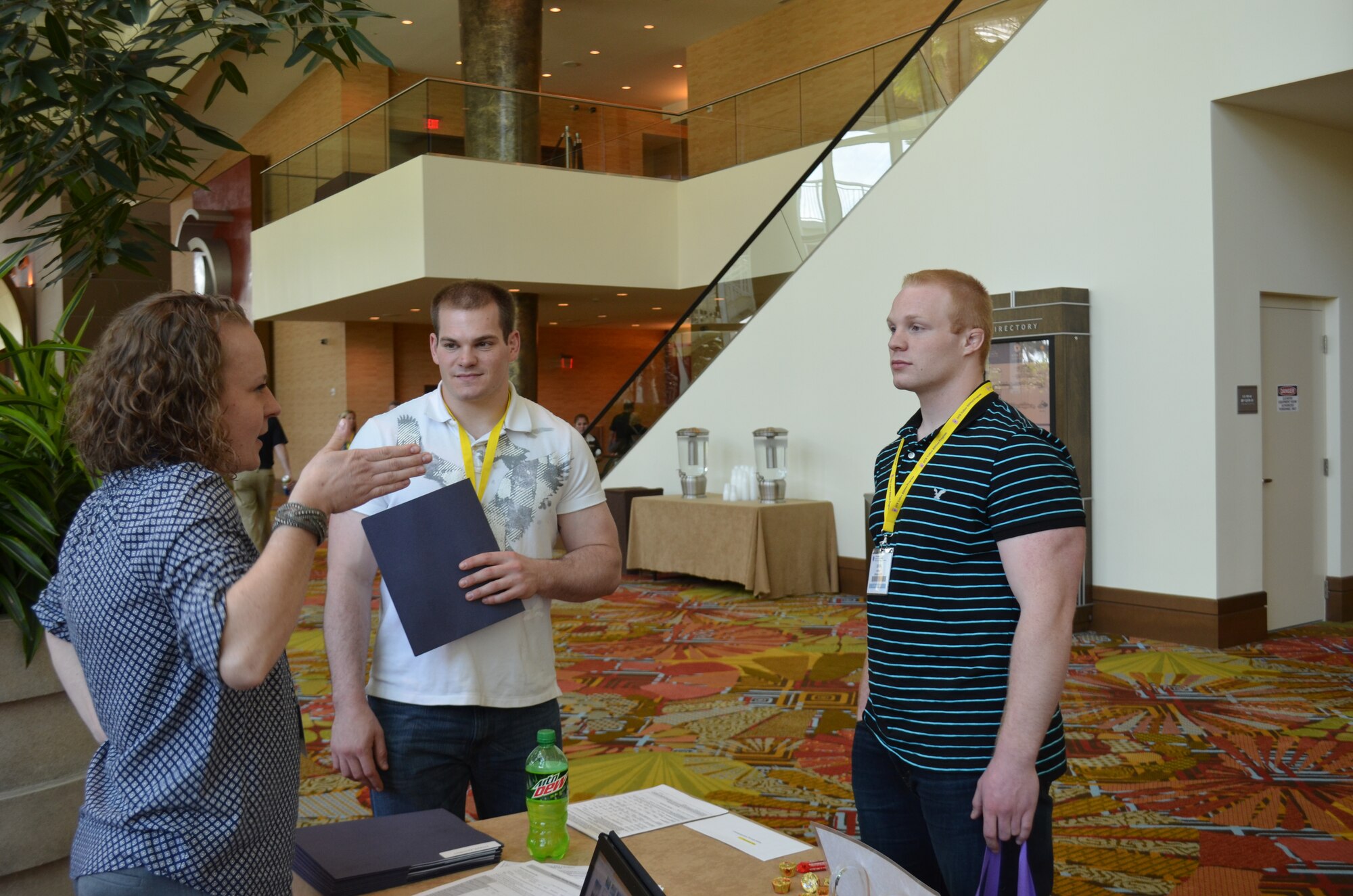 Tech. Sgt. Emily Georgi, 442d Fighter Wing Finance Office, gives financial and travel voucher advice to attendees of Yellow Ribbon March 28 in Orlando, Fla. Approximately 900 Air Force Reservists from across the country were in attendance at the three day event to help reintegrate back to their civilian lives both before and after a deployment. About 20 Airman from the 442d FW went to the event with their families following a six month deployment to southwest Asia in 2014. (U.S. Air Force photo by Capt. Denise Haeussler)