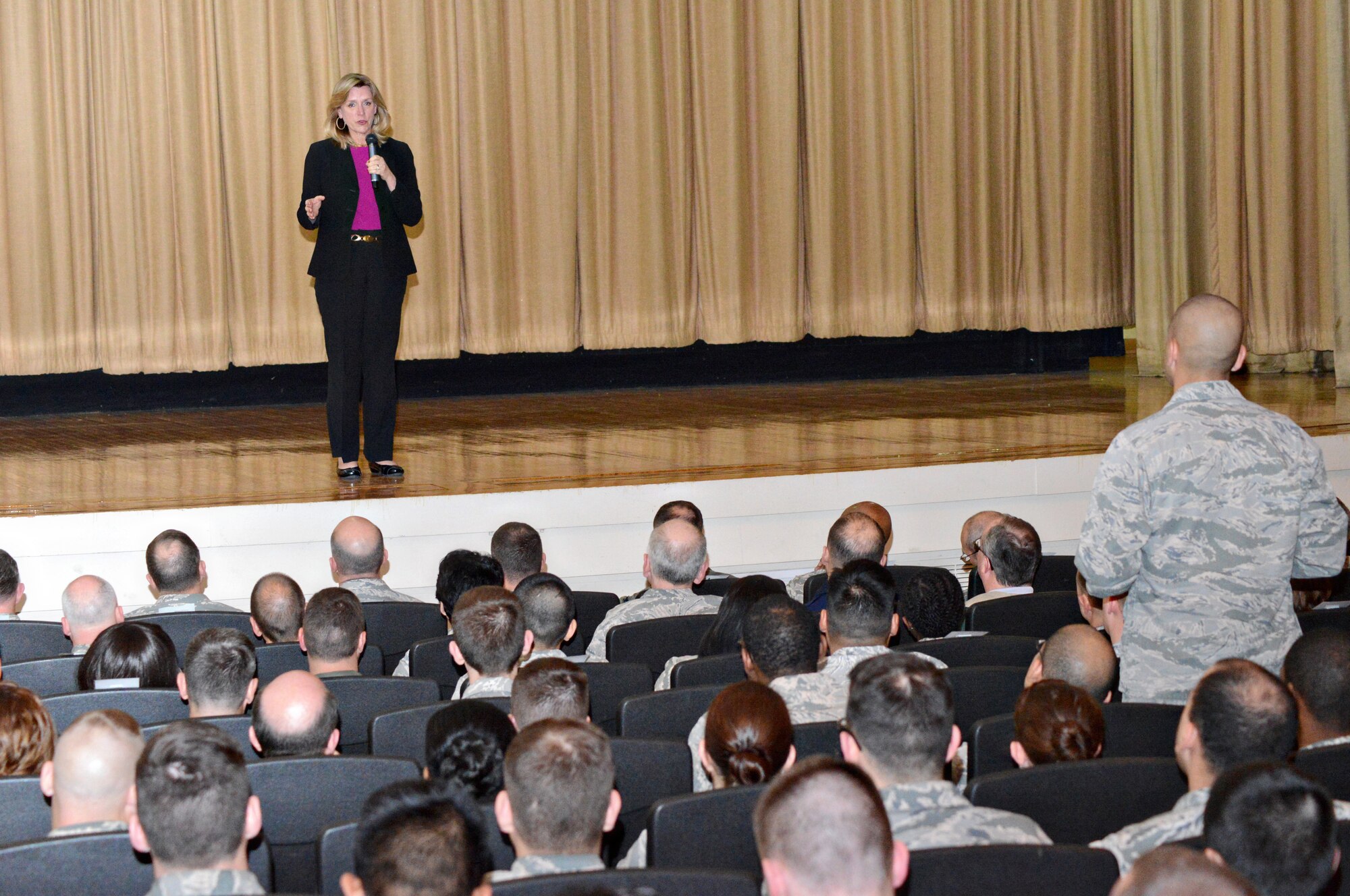 Air Force photo by Kelly White

Secretary of the Air Force Deborah Lee James speaks with Airmen about her priorities for the Air Force and fielded questions from attendees at a Tinker Auditorium All Call March 27. Earlier in the day, Secretary James visited several units across the base, including the Oklahoma City Air Logistics Complex, the 507th Air Refueling Wing, the 552nd Air Control Wing and the 72nd Air Base Wing.
