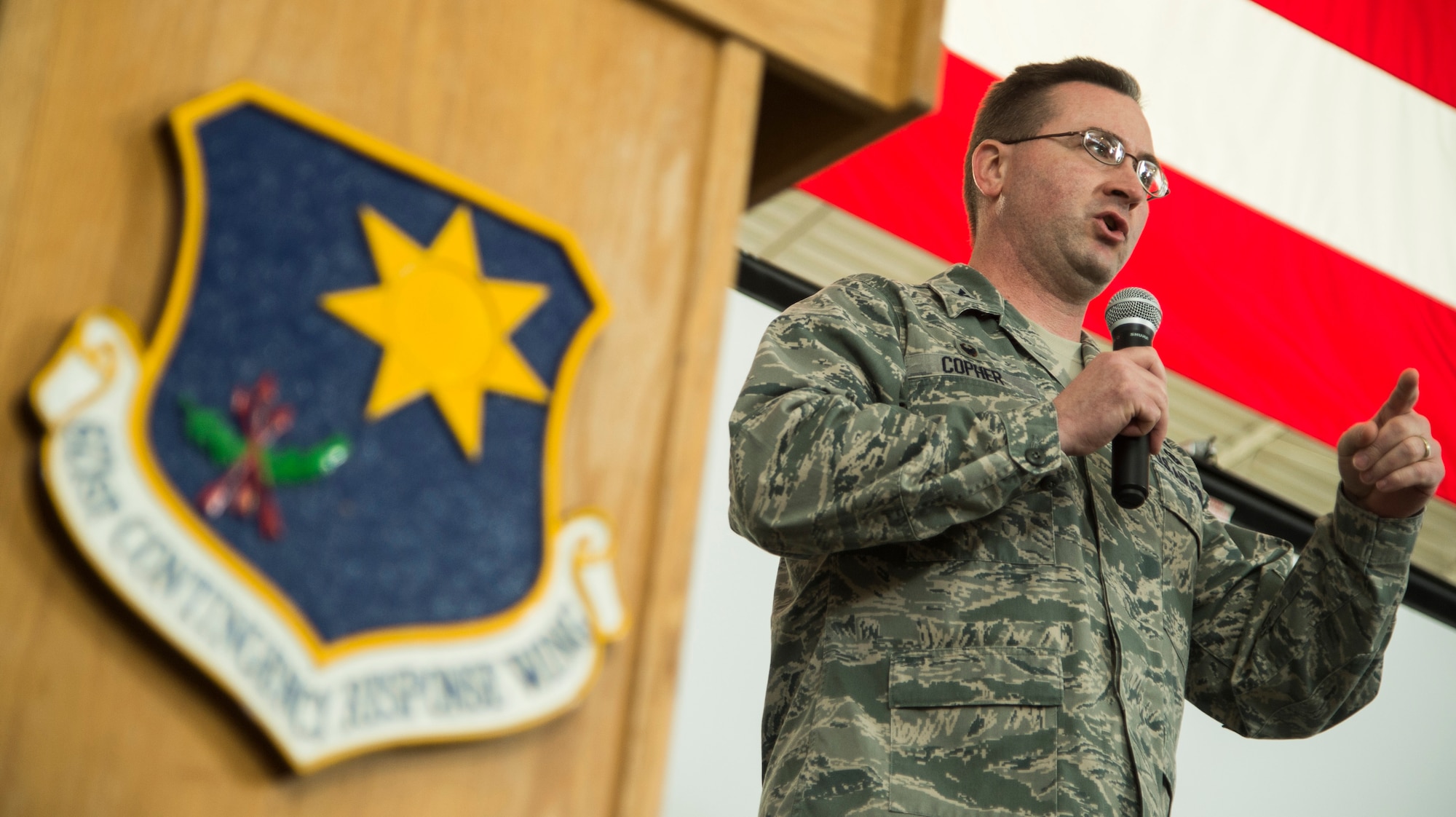 Col. James Copher, 621 Contingency Response Wing commander, speaks during the Devil Raid Mobility Exercise competition winner announcements at Joint Base McGuire-Dix-Lakehurst, N.J., April 2, 2015. (U.S. Air Force photo/Staff Sgt. Gustavo Gonzalez/RELEASED)