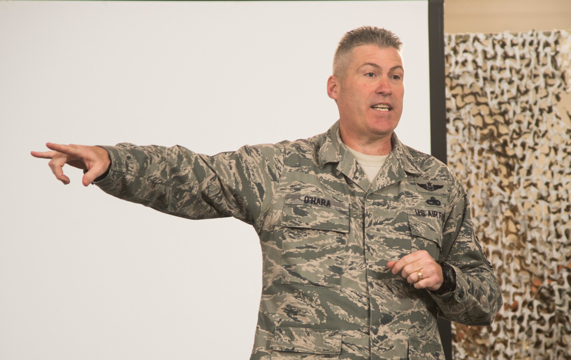 Chief Master Sgt. David O'Hara, 621st Contingency Response Wing command chief, speaks during the Devil Raid Mobility Exercise competition winner announcements at Joint Base McGuire-Dix-Lakehurst, N.J., April 2, 2015. (U.S. Air Force photo/Staff Sgt. Gustavo Gonzalez/RELEASED)
