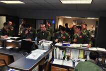 B-52H Stratofortress crewmembers prepare to be briefed before a training mission on Minot Air Force Base, N.D., April 1, 2015. The training mission, coined “POLAR GROWL”, aims to support bomber training requirements, ensuring global strike capabilities are flexible, credible and responsive to various threats. (U.S. Air Force photos/Senior Airman Malia Jenkins)