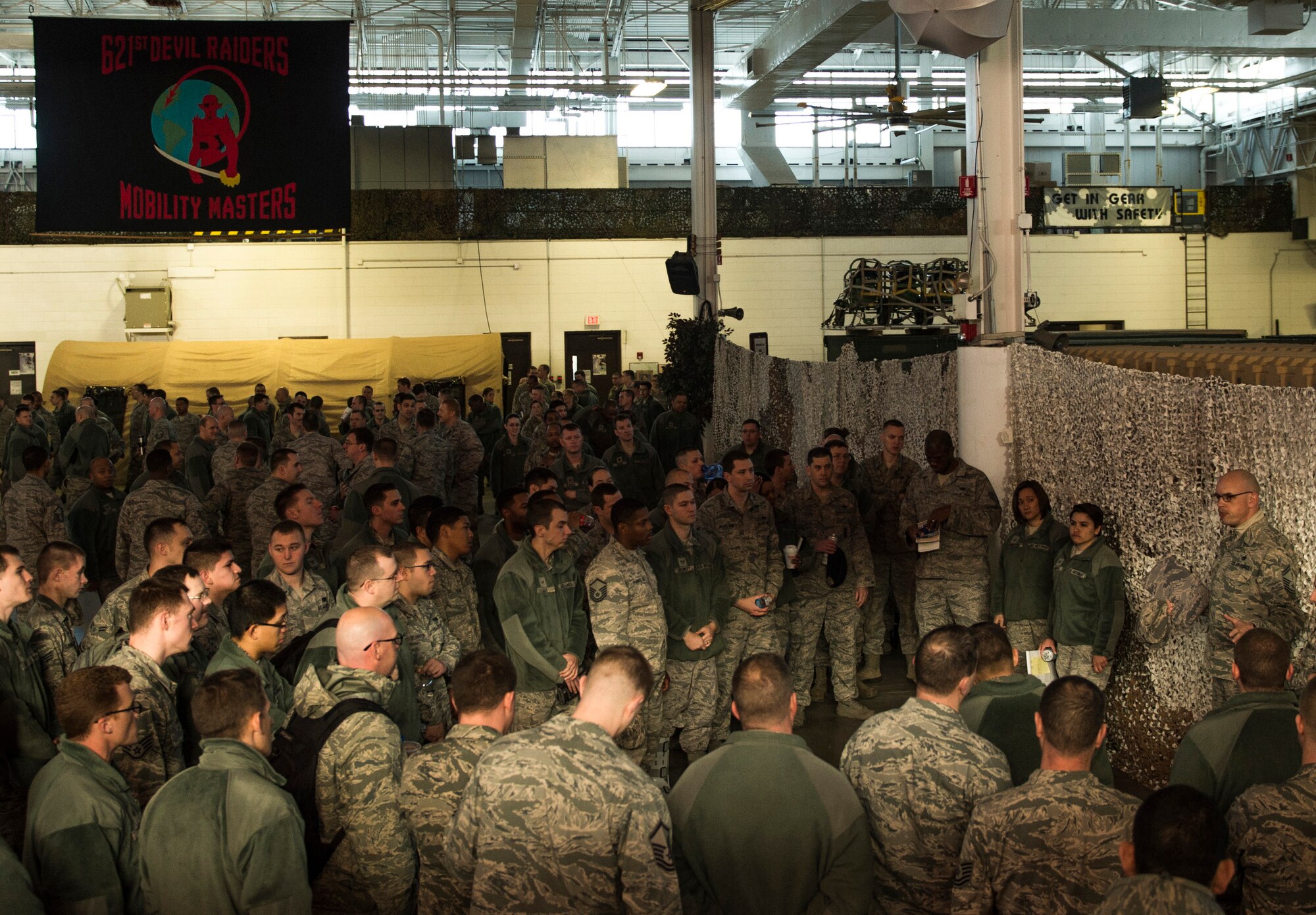 Airmen gather to prepare for the Devil Raid Mobility Exercise competition at Joint Base McGuire-Dix-Lakehurst, N.J., March 31, 2015. Approximately 225 members of the 818th and 817th Contingency Response Groups participated in the exercise. (U.S. Air Force photo/Staff Sgt. Marquis Williams/RELEASED)