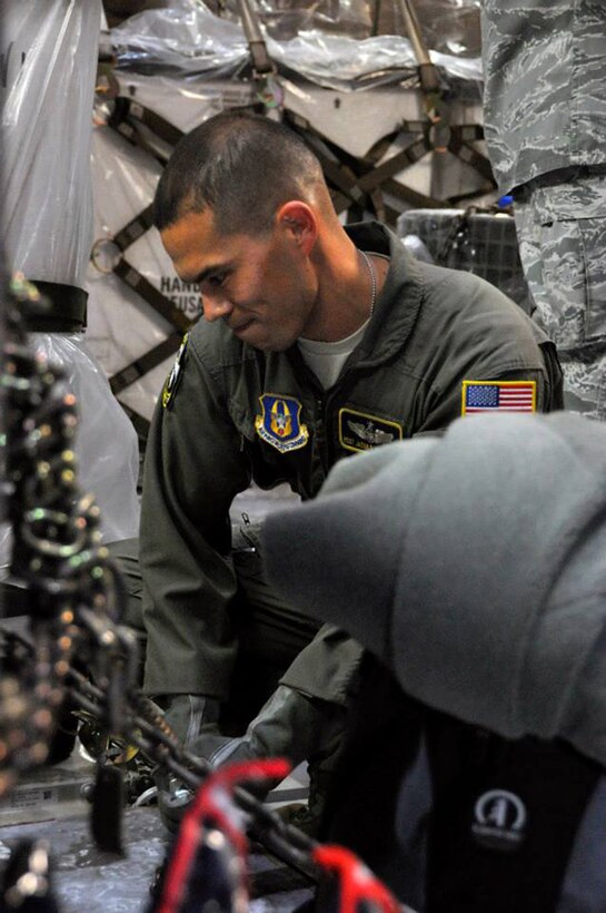 A Travis Air Force Base aircrew, maintenance and operations team comprised of 349th Air Mobility Wing Reservists and 60th Air Mobility Wing active duty members set a historical precedence in the first hour of today, April 3, 2015. (U.S. Air Force photos/ Senior Airman Madelyn Brown)