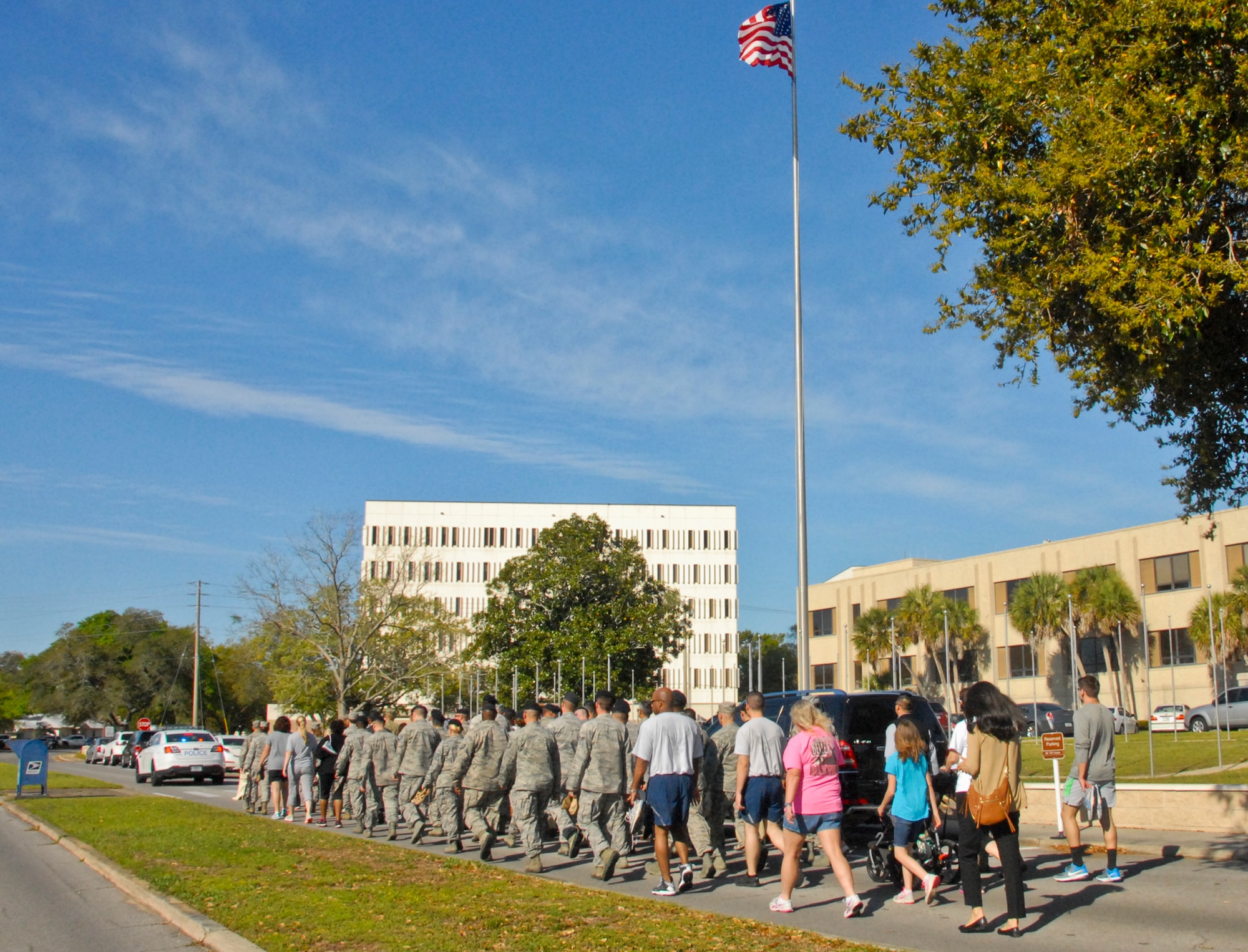 Sexual Assault Awareness Month kicked off with the first “Walk a Mile In Their Shoes” event April 1 at Eglin Air Force Base, Fla.  Brig. Gen David Harris, 96th Test Wing commander, led approximately 100 military and civilian community members to the 96th TW headquarters building, from the Breeze dining facility.  The walkers also dropped off more than 100 pairs of shoes at the headquarters’ lobby to symbolize walking in a sexual assault victim’s path to healing and to help raise awareness about the seriousness of sexual violence.  (U.S. Air Force photo/Kevin Gaddie)  