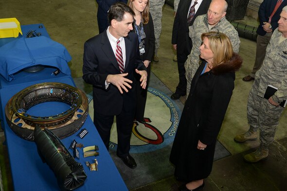 Secretary of the Air Force Deborah Lee James is briefed by Matt Meininger, Air Force Research Laboratory Turbine Engine Division adaptive engine program manager, about some of the latest advancements in turbine engines at Wright-Patterson Air Force Base on March 26.  (Air Force photo by Wesley Farnsworth)  