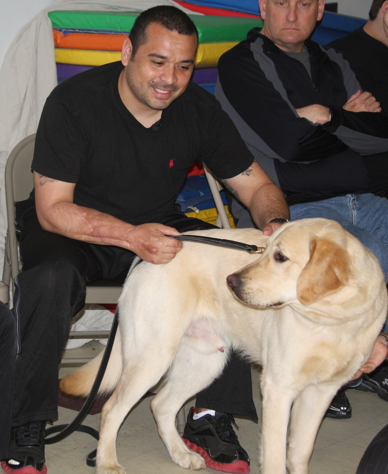 Marine veteran Jesse Longoria teamed up with service dog Moe four years ago, which was 4 Paws for Ability’s first placement. The next, to an Air Force veteran, will be in September 2015. Another Air Force veteran expects to be matched with a service dog in February 2016. (Contributed photo)  
    
