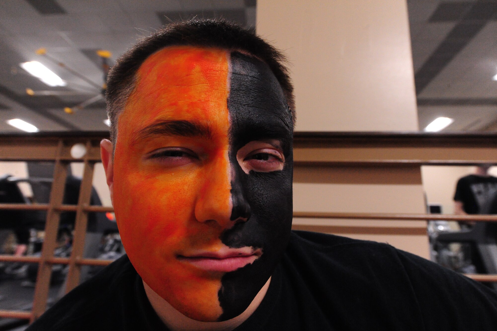 Capt. Justin Allston, 53rd Test Management Group operations analyst, shows off his face paint during the Whiteman Winter Olympics at Whiteman Air Force Base, Mo., March 27, 2015. The Whiteman Winter Olympics was a base wide event that gave each unit an opportunity to compete in various events including dodgeball, Wallyball, table tennis and many others. (U.S. Air Force photo by Staff Sgt. Nick Wilson/Released)