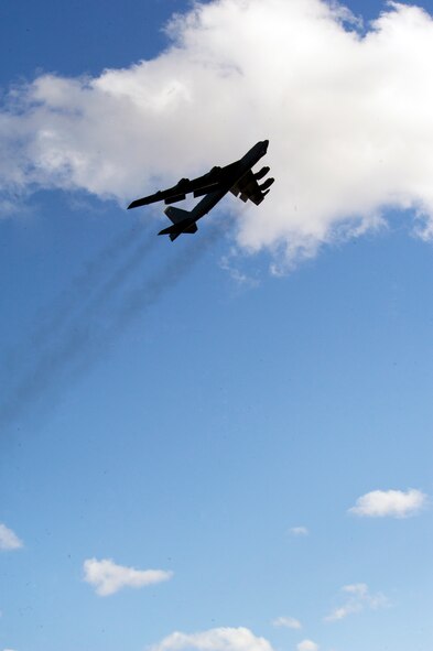 A B-52H Stratofortress flies over Minot Air Force Base, N.D. during a training mission, April 1, 2015. The training mission, coined “POLAR GROWL”, aims to provide unique training opportunities while testing the bomber force’s command and control apparatus’ ability to support two synchronized flight paths.  (U.S. Air Force photo/Senior Brittany Y. Bateman)