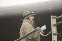 Airmen from the 5th Aircraft Maintenance Squadron load weapons on a B-52H Stratofortress during an exercise on Minot Air Force Base, N.D., March 24, 2015. The exercise provides training opportunities for forces to deter and, if necessary, defeat a military attack against the United States. (U.S. Air Force photo/Senior Airman Brittany Y. Bateman) 