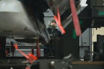 Airmen from the 5th Aircraft Maintenance Squadron load weapons on a B-52H Stratofortress during an exercise on Minot Air Force Base, N.D., March 24, 2015. The exercise provides training opportunities for forces to deter and, if necessary, defeat a military attack against the United States. (U.S. Air Force photo/Senior Airman Brittany Y. Bateman) 