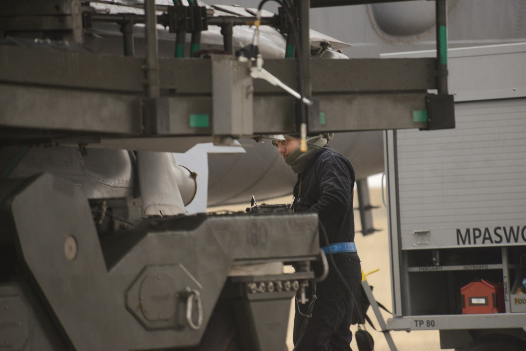 Airmen from the 5th Aircraft Maintenance Squadron load weapons on a B-52H Stratofortress during an exercise on Minot Air Force Base, N.D., March 24, 2015. The exercise provides training opportunities for forces to deter and, if necessary, defeat a military attack against the United States. (U.S. Air Force photo/Senior Airman Brittany Y. Bateman) 