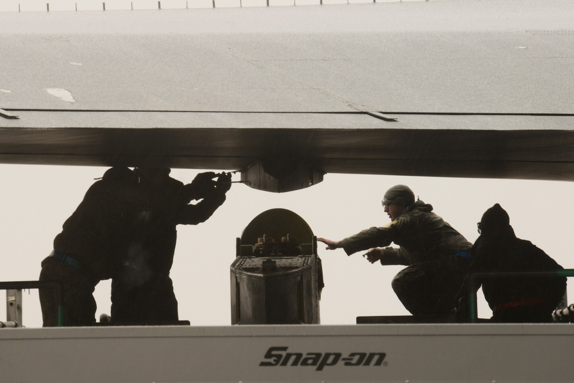 Airmen from the 5th Aircraft Maintenance Squadron load weapons on a B-52H Stratofortress during an exercise on Minot Air Force Base, N.D., March 24, 2015. The exercise provides training opportunities for forces to deter and, if necessary, defeat a military attack against the United States. (U.S. Air Force photo/Senior Airman Brittany Y. Bateman) 