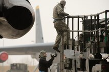 Airmen from the 5th Aircraft Maintenance Squadron load weapons on a B-52H Stratofortress during an exercise on Minot Air Force Base, N.D., March 24, 2015. The exercise provides training opportunities for forces to deter and, if necessary, defeat a military attack against the United States. (U.S. Air Force photo/Senior Airman Brittany Y. Bateman) 