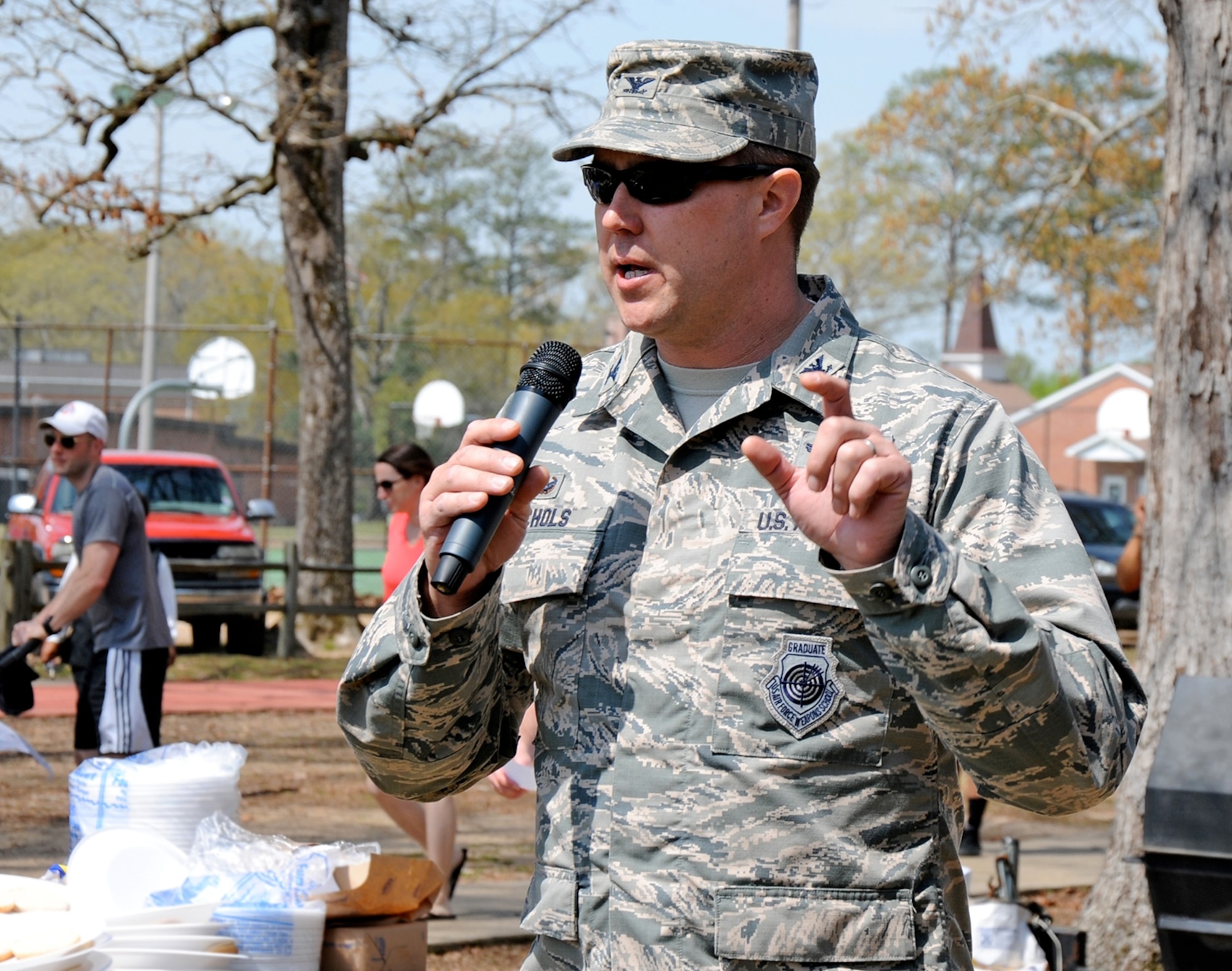 Col. John Nichols, 14th Flying Training Wing Commander, speaks to Team BLAZE members April 1 at Freedom Park on Columbus Air Force Base, Mississippi, about the Unit Effective Inspection and thanks them for their hard work. The UEI was held March 23-30 and evaluated Columbus Air Force Base in how well it performed in four major graded areas: executing the mission, managing resources, improving the unit and leading people. (U.S. Air Force photo/Sharon Ybarra)