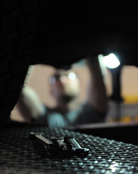 Tools sit on a vehicle lift at the 5th Logistics Readiness Squadron maintenance shop at Minot Air Force Base, N.D., April 2, 2015. Airmen from the 5th LRS vehicle maintenance flight repair and maintain various types of vehicles to ensure Team Minot stays mobile. (U.S. Air Force photo/Senior Airman Kristoffer Kaubisch)
