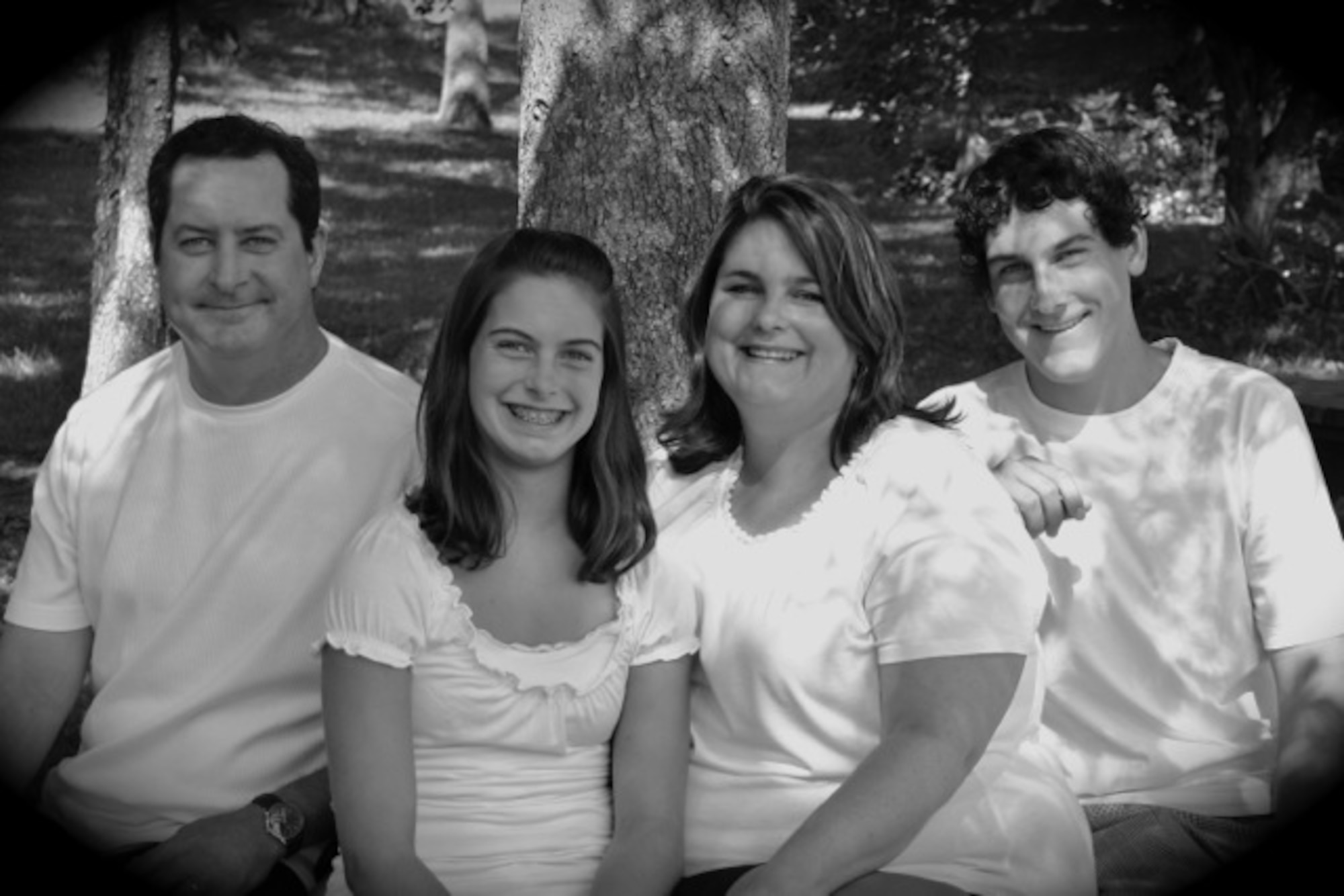 Late, Col. Kenneth Walters, former 19th Mission Support Group deputy commander, with his family, (daughter, Paige, wife, Amy, and son, Ryan), pose for a family photo in 2009. Col. Walters passed away in 2012 from cancer. (courtesy photo)
