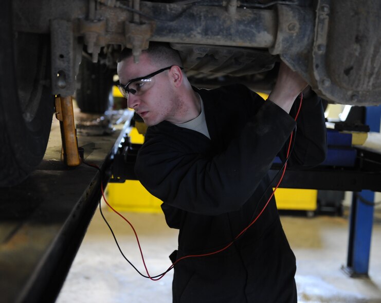 Senior Airman Justin Van Dyke, 5th Logistics Readiness Squadron vehicle maintenance journeyman, uses a multi-meter to troubleshoot a rear speed sensor on a security forces government-operated vehicle on Minot Air Force Base, N.D., April 2, 2015. Although the vehicle maintenance shop works on multiple squadron’s vehicles, their main mission is to support security forces. (U.S. Air Force photo/Senior Airman Kristoffer Kaubisch)