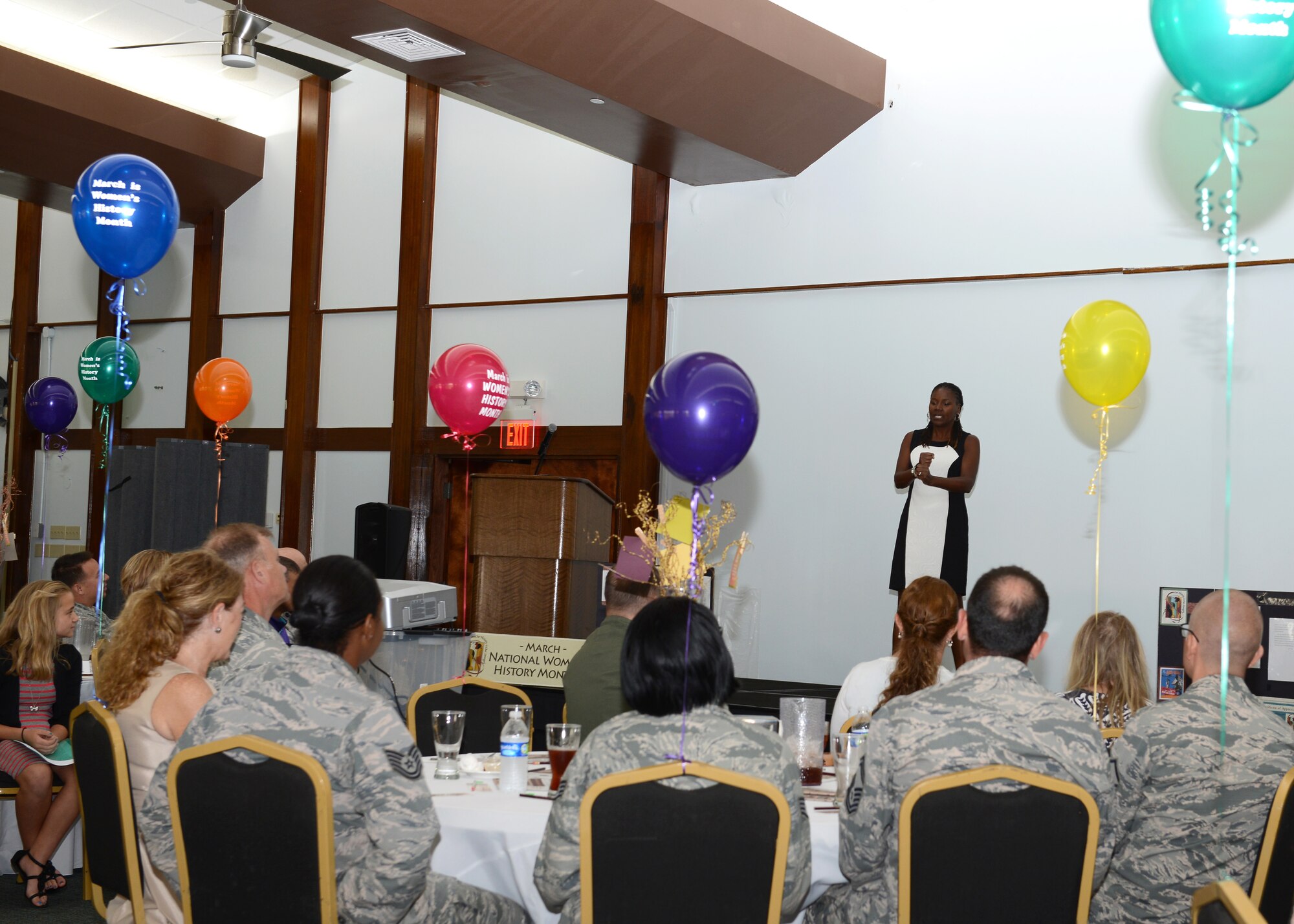 Tanya McMillan, an Air Force retiree and wife of 36th Wing Command Chief Master Sgt. Michael McMillan’s wife, speaks during a Women’s History Month luncheon March 31, 2015, at Andersen Air Force Base, Guam. This year’s theme is ‘Weaving the Stories of Women’s Lives’ and focused on sharing the experiences and obstacles women faced. (U.S. Air Force photo by Airman 1st Class Arielle Vasquez/Released)