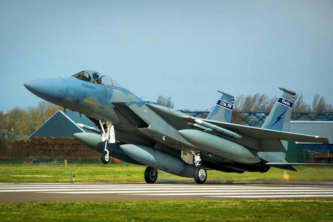 A U.S. Air Force F-15C Eagle aircraft lands at Leeuwarden Air Base in the Netherlands, March 31, 2015. The aircraft's crew members are assigned to the Florida Air National Guard's 159th Expeditionary Fighter Squadron.
