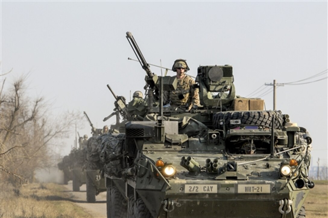 U.S. soldiers in Stryker armored vehicles arrive at Smardan Training Area, Romania, March 24, 2015. The soldiers, assigned to 2nd Squadron, 2nd Cavalry Regiment, participated in Saber Junction 15, which included 5,000 troops from 17 nations that are NATO allies and partners.