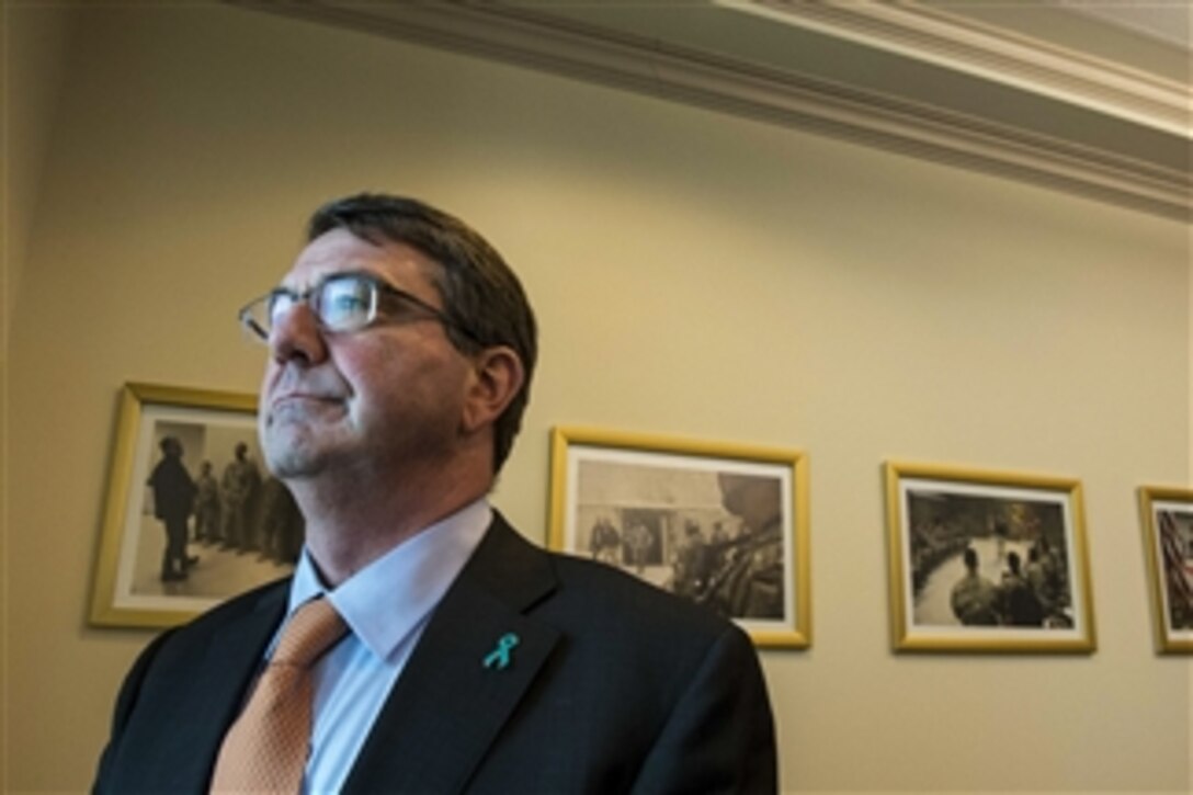 Defense Secretary Ash Carter wears a teal pin at the Pentagon in recognition of Sexual Assault Awareness and Prevention Month, April 2, 2015. The theme for this year’s observance is "Eliminate Sexual Assault: Know Your Part. Do Your Part."