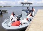 Members of the 62nd Civil Support Team, Louisiana National Guard begin waterborne operations during Marlinspike 2015, an interagency exercise hosted by the Mississippi National Guard, with more than 100 participants from local, state and federal agencies. The main effort includes Civil Support Teams from the Mississippi, Alabama and Louisiana National Guards responding to a maritime weapon of mass destruction threat.