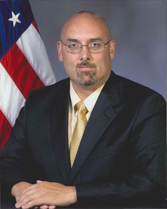 Mr. Deligne, a member of the Senior Executive Service since 2007, is currently the Executive Director of the Naval Sea Systems Command (NAVSEA). NAVSEA is an Echelon II Command responsible for the technical authority, development, acquisition, and lifecycle support of U.S. Navy Ships and Integrated Warfare Systems.