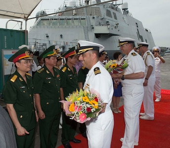 DA NANG, Vietnam (Apr. 6, 2015) - Cmdr. Matthew Kawas, commanding officer of the littoral combat ship USS Fort Worth (LCS 3) Crew 103, greets counterparts during the welcoming ceremony of Naval Engagement Activity (NEA) Vietnam 2015. In its sixth year, NEA Vietnam is designed to foster mutual understanding, build confidence in the maritime domain and strengthen relationships between the U.S. Navy, Vietnam People's Navy and the local community. 