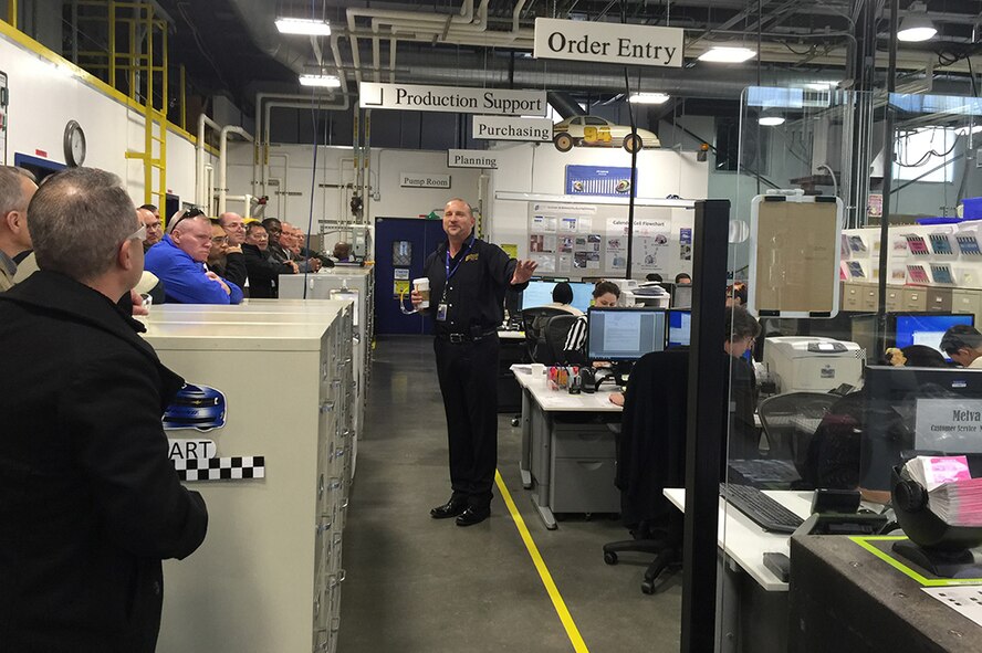 Mike Moran, general manager at Cascade Gasket & Manufacturing Company Inc., in Kent, Washington, provides a tour to people from the 446th Airlift Wing, Joint Base Lewis-McChord, Washington Jan. 12. The tour highlighted a company successfully implementing a culture of continuous process improvement. (Courtesy photo)