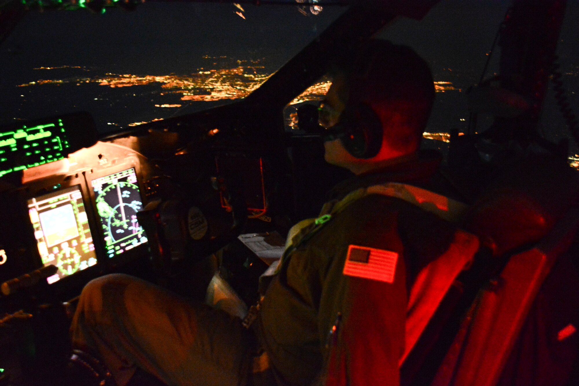 Maj. Matt Etlinger, 312th Airlift Squadron pilot, flies over Northern California April 3 in a C-5M Super Galaxy from Travis Air Force Base, California. Etlinger acted as co-pilot for the record-setting flight. (U.S. Air Force photo by Airman 1st Class Amber Carter)