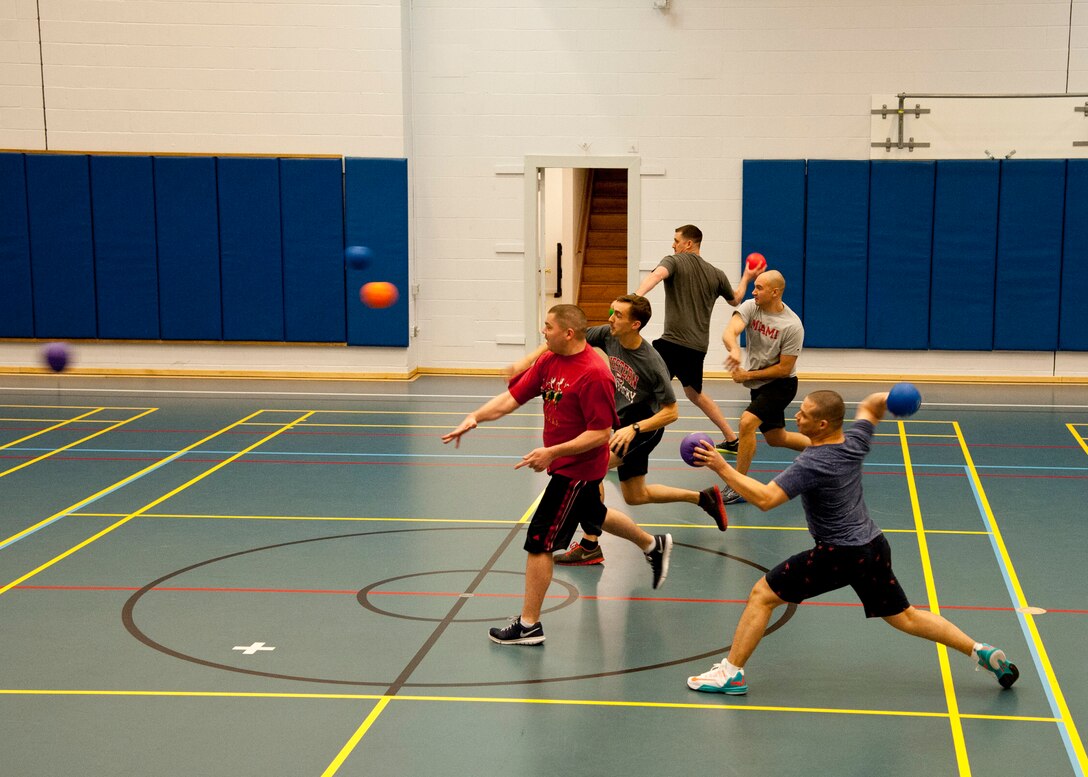 THULE AIR BASE, Greenland – Members of Thule AB dominate during a dodgeball game at the Thule Fitness Center March 20, 2015. The Rising Six council organizes various morale events on Thule AB, including a once-a-month sports day activity for the members of Team Thule. (U.S. Air Force photo by Senior Airman Tiffany DeNault)