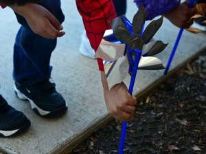 Children from the Pershing Child Development Center plant pinwheels as part of Child Abuse Prevention Month at Fort Eustis, Va., April 2, 2015. During the month of April, family advocacy programs, health centers and parents raise awareness to support Child Abuse Prevention Month. (U.S. Air Force photo by Senior Airman Kimberly Nagle/Released)