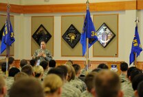 Col. Tom Wilcox, 341st Missile Wing commander, talks to Airmen at the first of four commander’s calls April 2 at the Grizzly Bend, Malmstrom Air Force Base, Mont. Wilcox discussed the wing’s priorities, climate survey results and set realistic goals for the wing to accomplish in 2015. (U.S. Air Force photo/Airman 1st Class Dillon Johnston)