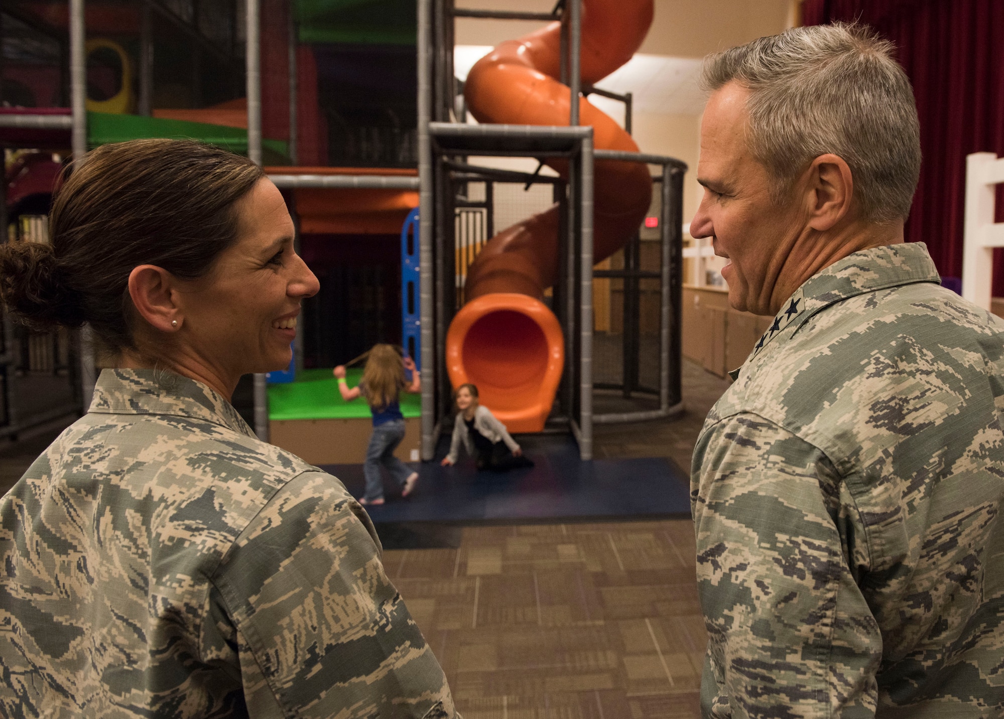 Lt. Gen. Chris Nowland, 12th Air Force (Air Forces Southern) commander, speaks to Maj. Erika Chute, 366th Force Support Squadron operations manager, about recent renovations to the Gunfighter Service Center at Mountain Home Air Force Base, Idaho, April 1, 2015. Healthy Base Initiative funds allowed the 366th FSS to create an indoor children’s gym so parents and their children can get in-shape and enjoy their downtime. (U.S. Air Force photo by Airman Connor J. Marth/RELEASED)