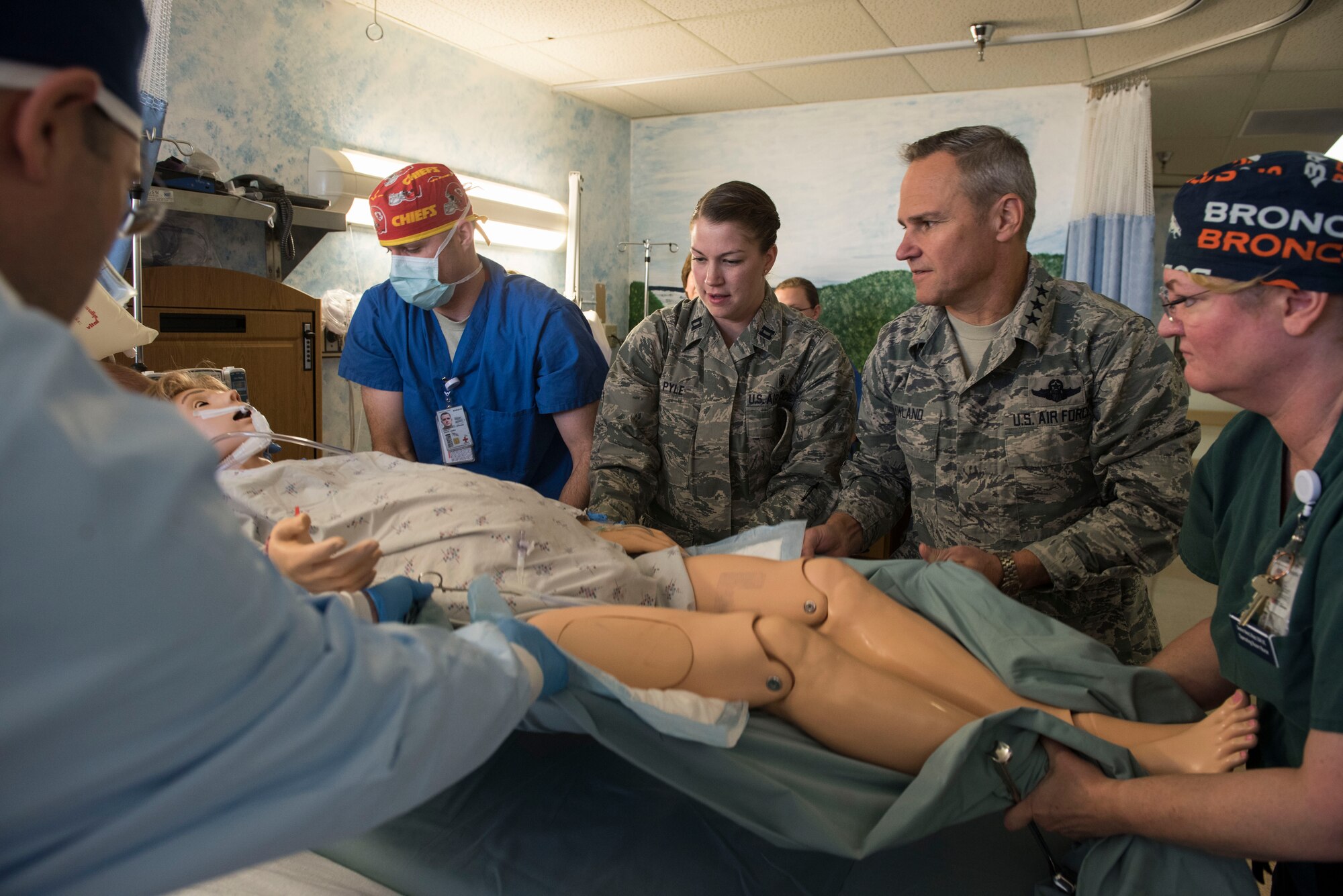 Lt. Gen. Chris Nowland (center-right), 12th Air Force (Air Forces Southern) commander, participates in a bleeding emergency protocol demonstration at Mountain Home Air Force Base, Idaho, April 1, 2015. The Medical Group performs monthly exercises to maintain emergency readiness. (U.S. Air Force photo by Airman Connor J. Marth/RELEASED)