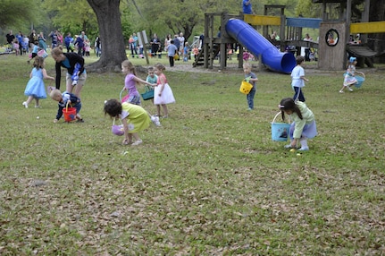 Kids hunt for Easter Eggs at the Weapons Station during the Month of the Military Child Easter Egg Hunt April 4, 2015 at Joint Base Charleston. More than 1,100 people came out to the Easter egg hunts at the Air Base and Weapons Station. The Weapons Station event was hosted buy JB Charleston Youth Programs and the Air Base event was hosted by Youth Programs and the JB Charleston Libraries. Each event held egg hunts for youth, as well as provided fun activities such as ball tosses, face painting and coloring stations. The Easter Bunny also made an appearance at each location. (Courtesy Photo)