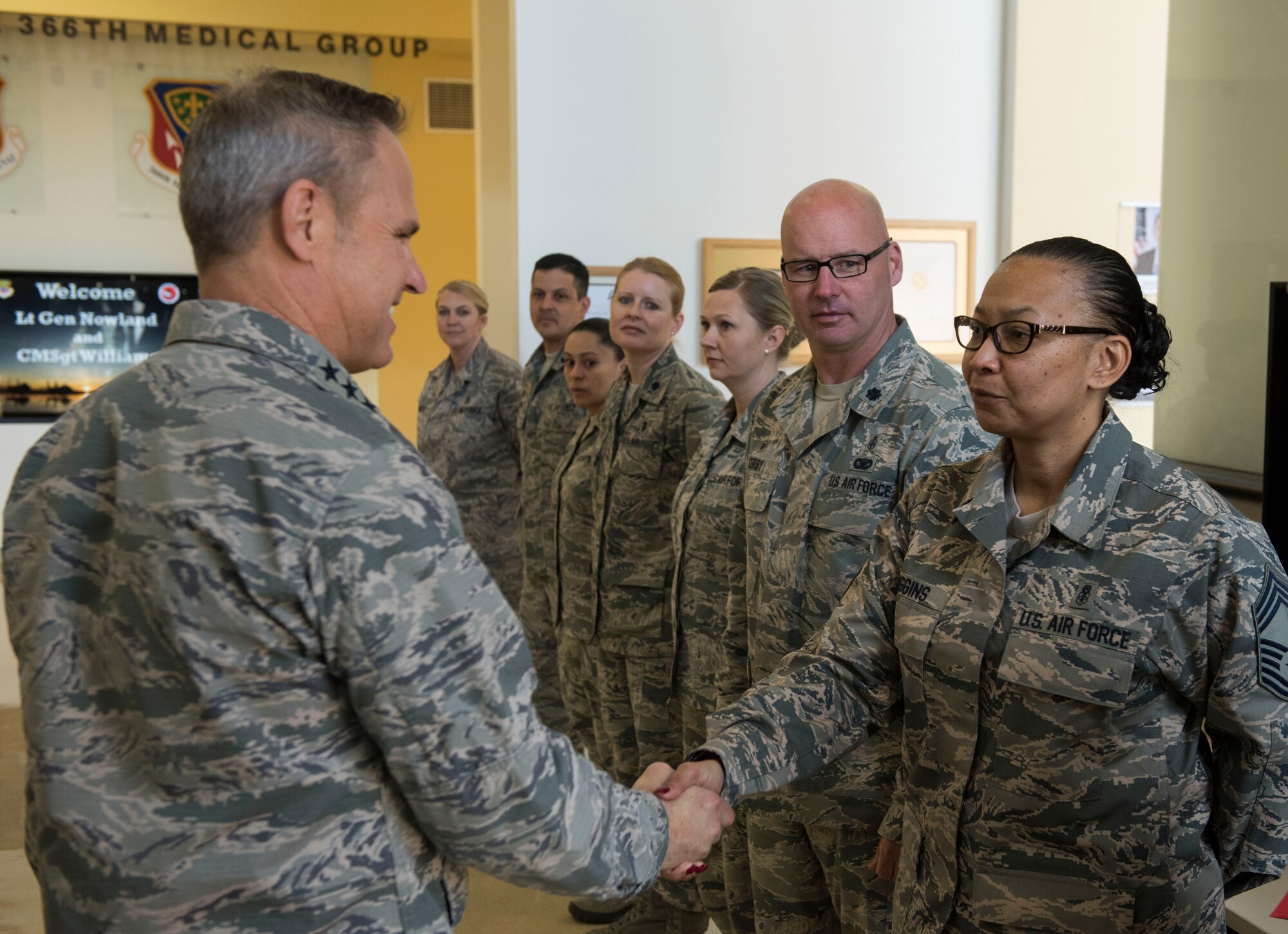 Lt. Gen. Chris Nowland, 12th Air Force (Air Forces Southern) commander, shakes hands with Chief Master Sgt. Rhonda Riggins, 366th Medical Operations Squadron superintendent, at Mountain Home Air Force Base, Idaho, April 1, 2015. Nowland met with the medical group’s superior performers and section leaders to highlight their outstanding achievements. (U.S. Air Force photo by Airman Connor J. Marth/RELEASED)