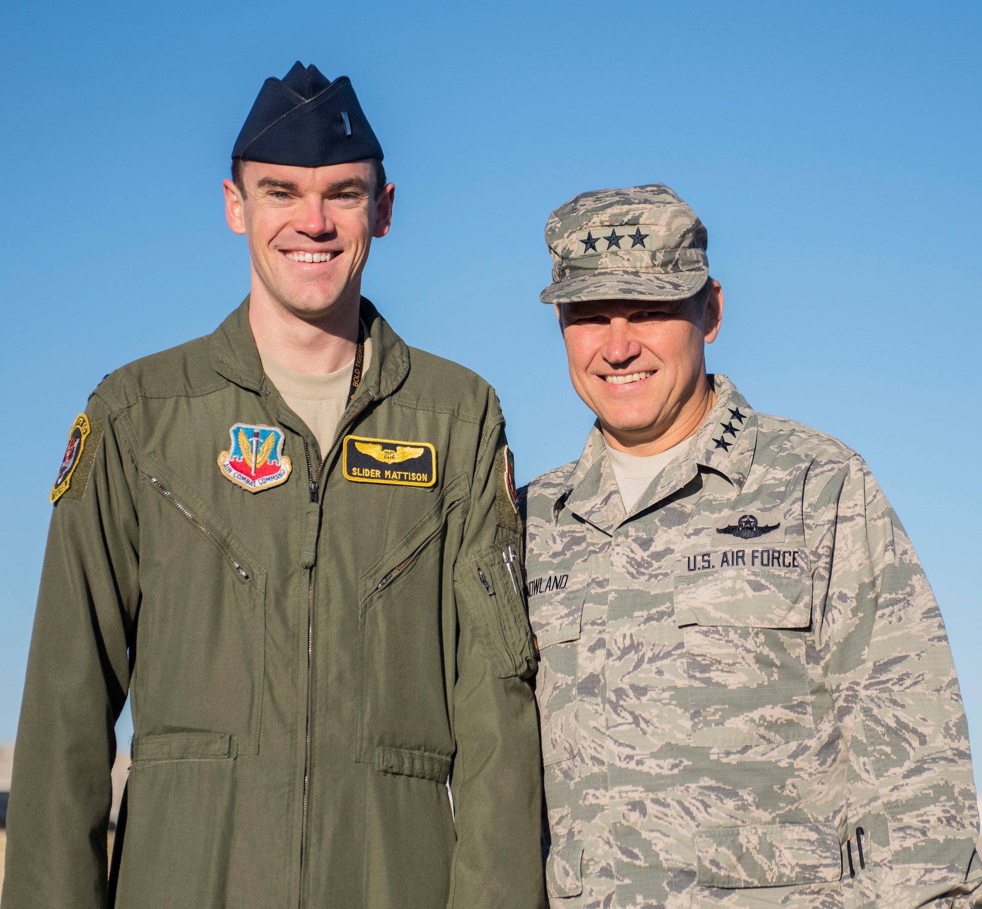 Lt. Gen. Chris Nowland (right), 12th Air Force (Air Forces Southern) commander, poses for a photo with 1st Lt. Joshua Mattison, 391st Fighter Squadron pilot, at Mountain Home Air Force Base, Idaho, April 1, 2015. Nowland worked with Mattion's father early in his career. (U.S. Air Force photo by Airman 1st Class Jeremy L. Mosier/RELEASED)