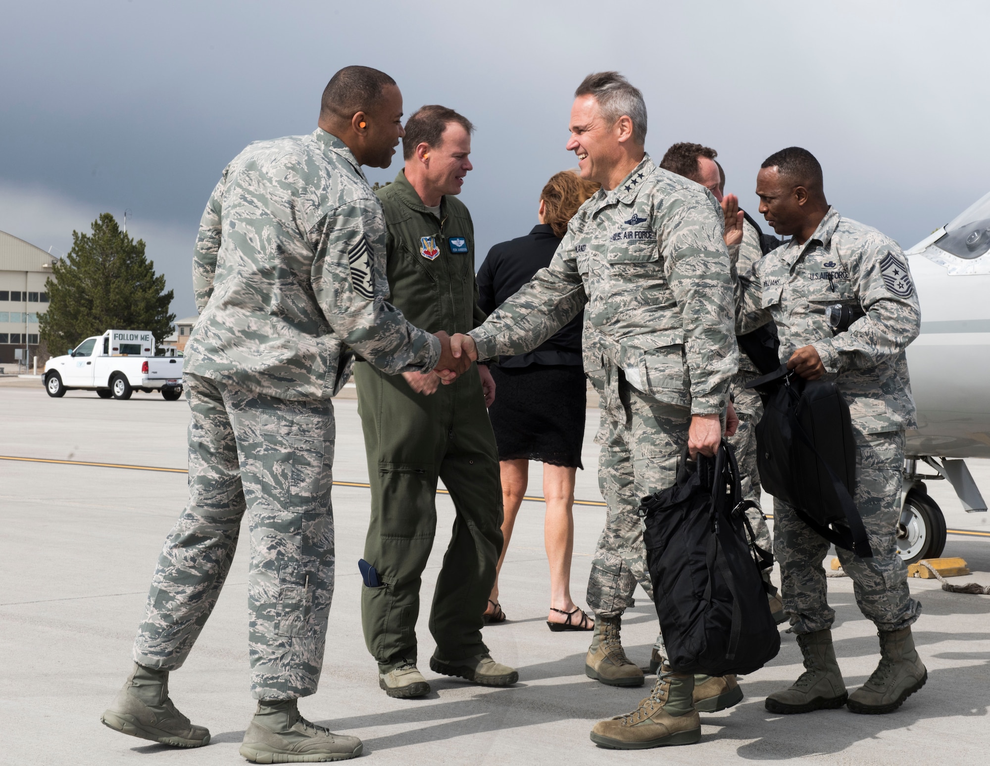 Lt. Gen. Chris Nowland (front right), 12th Air Force (Air Forces Southern) commander, meets with base leadership on the flightline at Mountain Home Air Force Base, Idaho, March 31, 2015. Nowland previously piloted numerous fighter aircraft including the F-15 Eagle, the single-seat version of the F-15E Strike Eagle flown at Mountain Home Air Force Base. (U.S. Air Force photo by Airman Connor J. Marth/RELEASED)