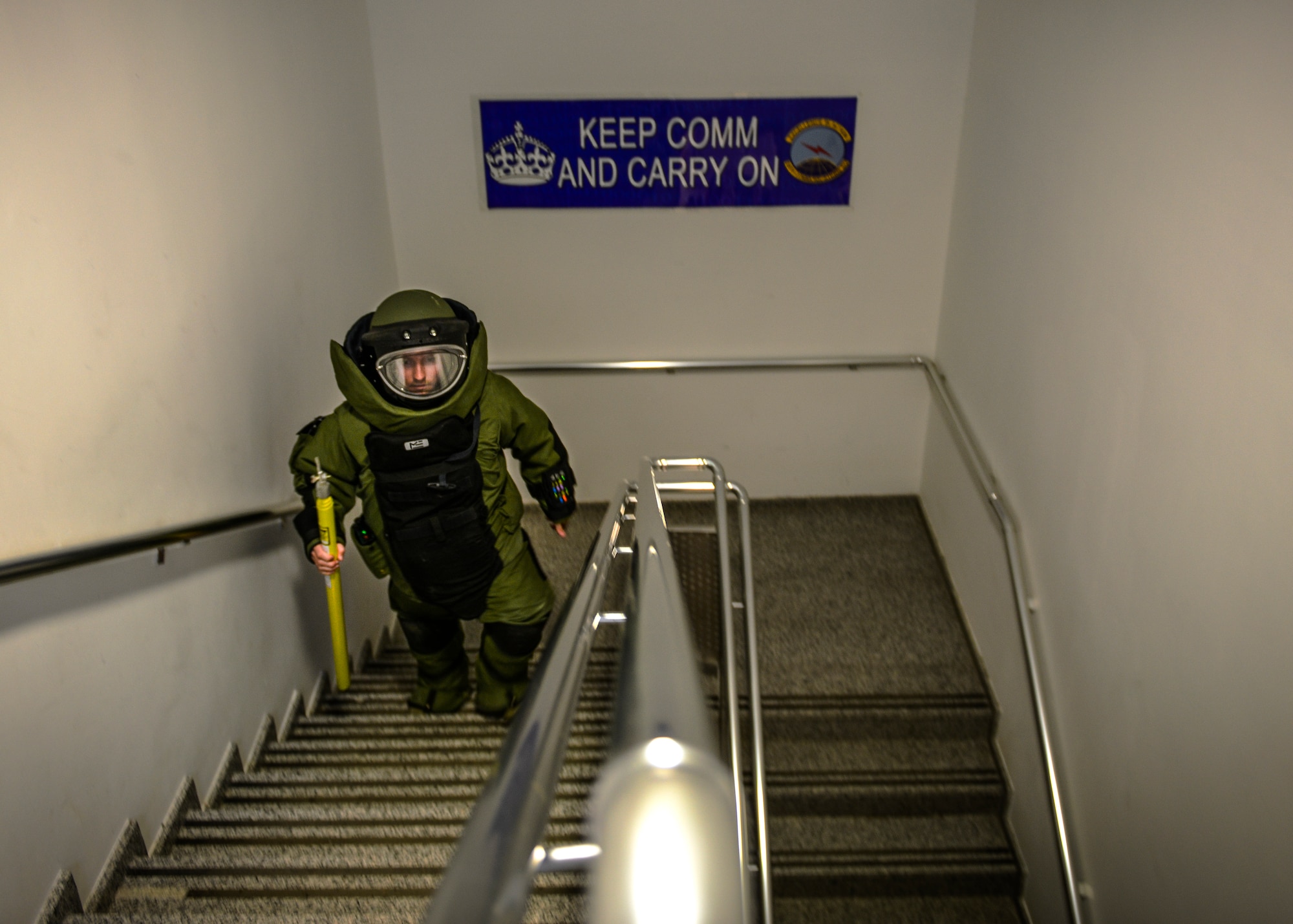 Staff Sgt. Alexander Blair, 39th Civil Engineer Explosive Ordinance Disposal journeyman, searches the 39th Communications Squadron building during an active shooter exercise March 30, 2015, at Incirlik Air Base, Turkey. Multiple base agencies participated in the exercise, which tested their readiness and effectiveness in case of a real-world emergency. (U.S. Air Force photo by Airman 1st Class Cory W. Bush/Released)