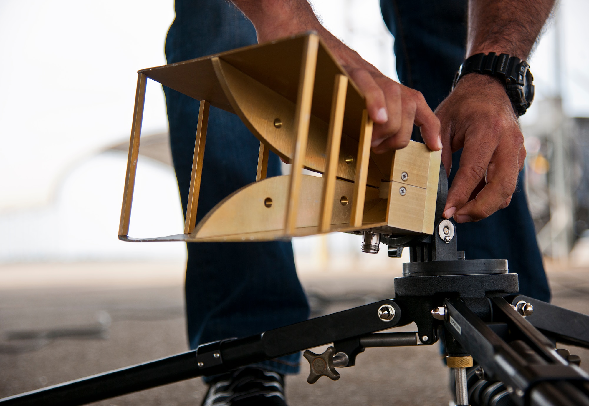 Irvin Fontanes, Air Force Seek Eagle office, configures a horn antenna prior to an electromagnetic interference and compatibility test of a LITENING pod on an F-15 Eagle March 18 at Eglin Air Force Base, Fla.  The test will measure the frequencies put out by the pod and ensure those transmissions do not interfere with the safe operation of the aircraft.  While the testing is performed on the ground, the aircraft is running with aircrew performing various flight procedures and reporting any interference.  This test is directly related to the AFSEO mission of ensuring new warfighter capabilities through the application and transfer of aircraft-store compatibility expertise.  (U.S. Air Force photo/Samuel King Jr.)