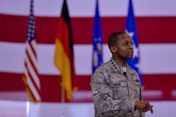 General Darren W. McDew, Air Mobility Command commander, speaks at an all-call at Ramstein Air Base, Germany, March 30, 2015. During his visit, he met with Ramstein Airmen and spoke to them about their role in the AMC mission and how they are impacting today’s Air Force. (U.S. Air Force photo/Senior Airman Nicole Sikorski) 