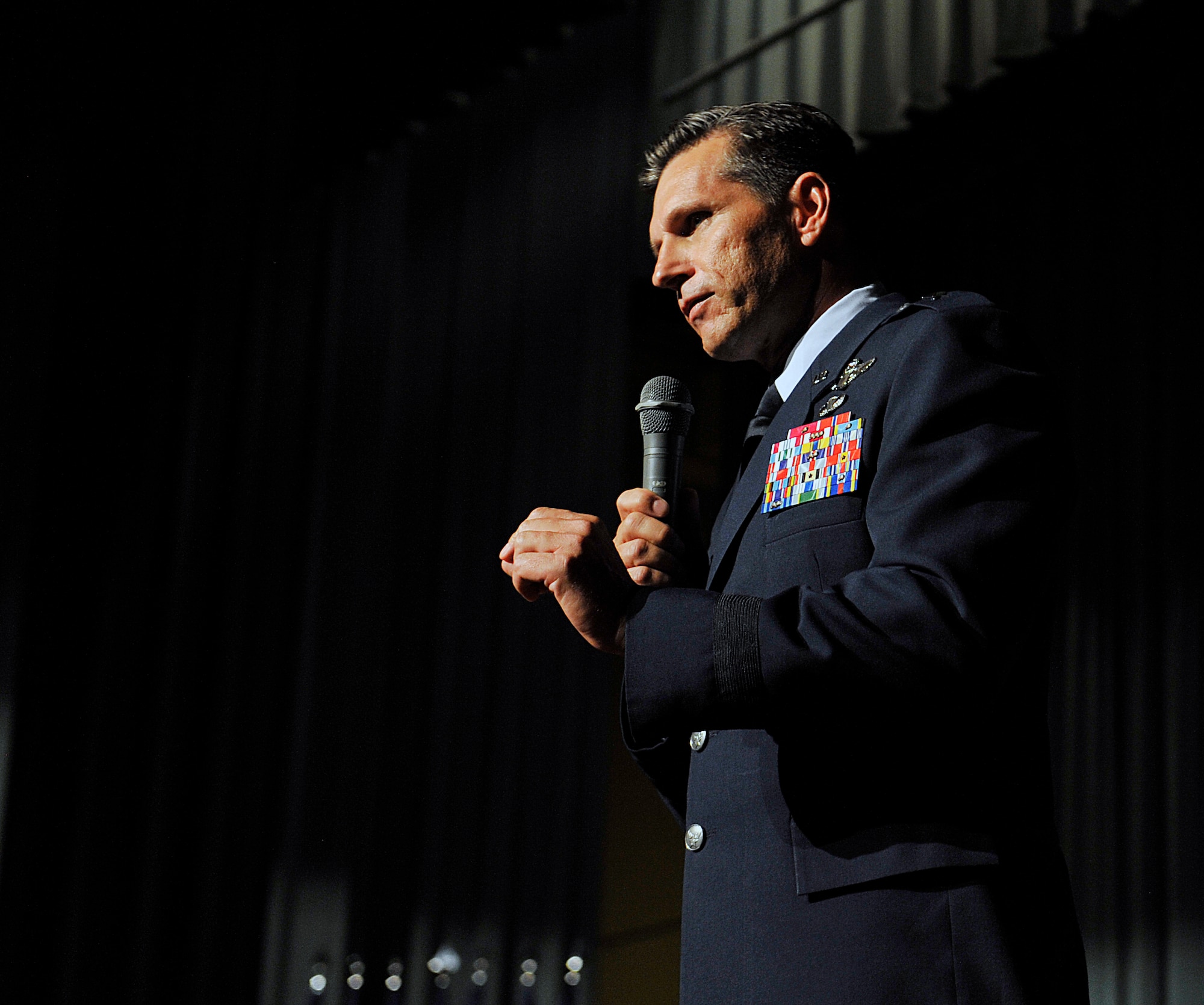 U.S. Air Force Brig. Gen. Barry Cornish, 18th Wing commander, speaks during the NCO Academy Class 15-3 graduation ceremony at the Keystone Theater on Kadena Air Base, Japan, April 3, 2015. Seventy-six students graduated from the six-week military leadership course readying them for NCO management roles and responsibilities. (U.S. Air Force photo by Naoto Anazawa)