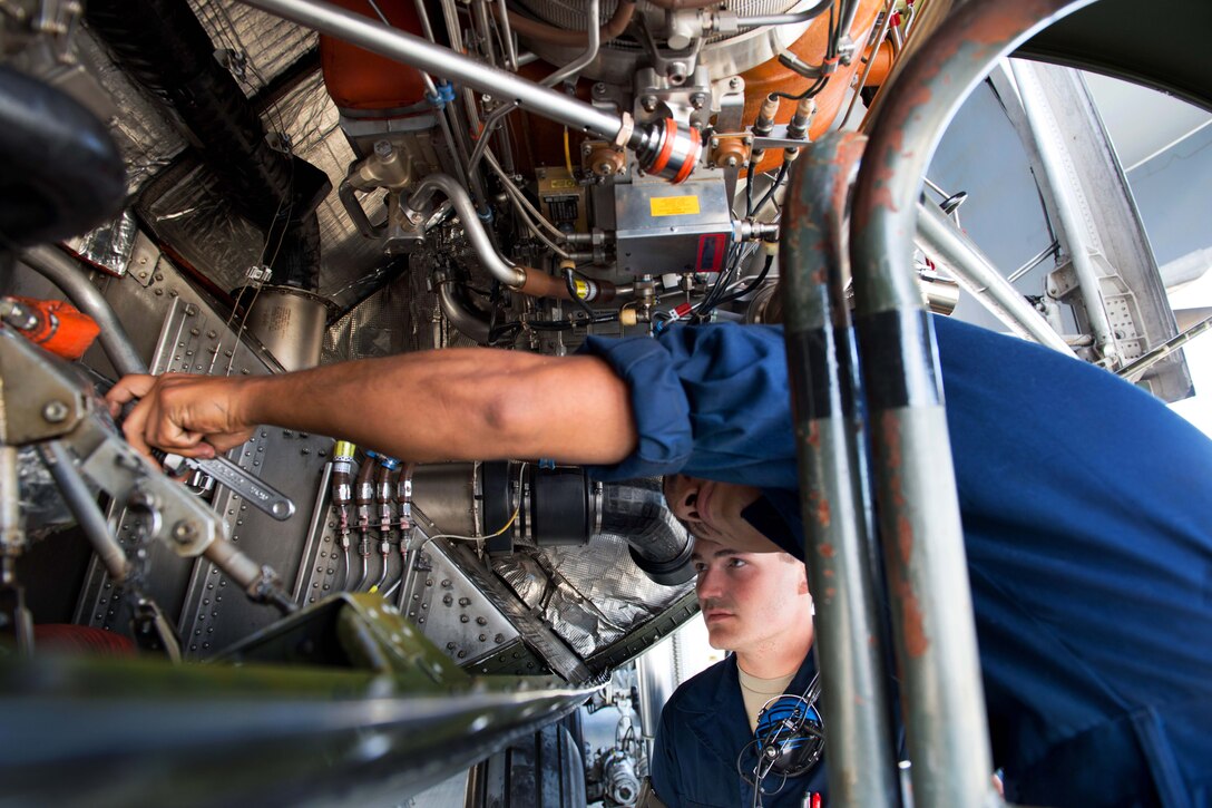 Airmen Work At A Steady Pace To Prepare A C-5m Super Galaxy Aircraft 