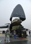 Members of Team Dover and the 337th Airlift Squadron,  Westover Air Reserve Base, Mass., load two Boeing Chinook CH-47Fs into a C-5 Super Galaxy March 27, 2015, at Dover Air Force Base, Del. Each helicopter weighted just shy of 24,000 pounds and were being shipped to the Australian Army. (U.S. Air Force photo/Airman 1st Class William Johnson)