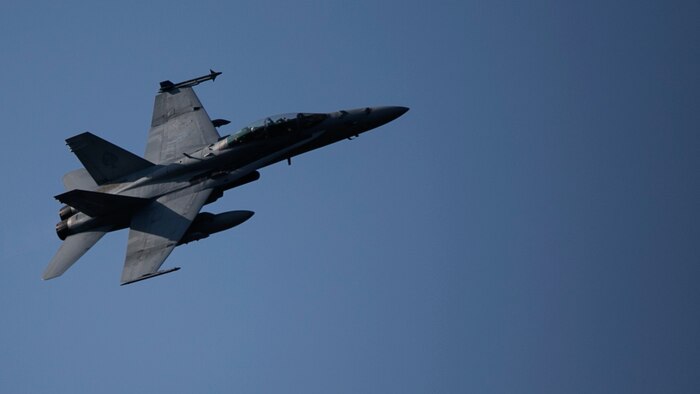 A U.S. Marine F/A-18 Hornet provides close air support March 28 at Pilsung Range in South Korea. U.S. Marines with 5th Air Naval Gunfire Liaison Company, III Marine Expeditionary Force Headquarters Group, III MEF, completed a week of fire support coordination training with Republic of Korea Marines, coordinating close air support with both ROK and U.S. aircraft for the training. The training is part of Korean Marine Exchange Program 15-14.2, a small-unit training exercise, which enhances the combat readiness and interoperability of ROK-U.S. forces. 