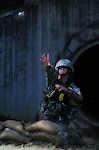 Staff Sgt. Kevin McMakin, from Headquarters and Headquarters Company, 48th Infantry Brigade Combat Team of the Georgia National Guard throws a grenade during the urban operations portion of the 2010 Best Warrior Competition at Fort Benning, Ga., July 30, 2010. The Soldier and NCO who win this competition will go on to compete at the Army level event.