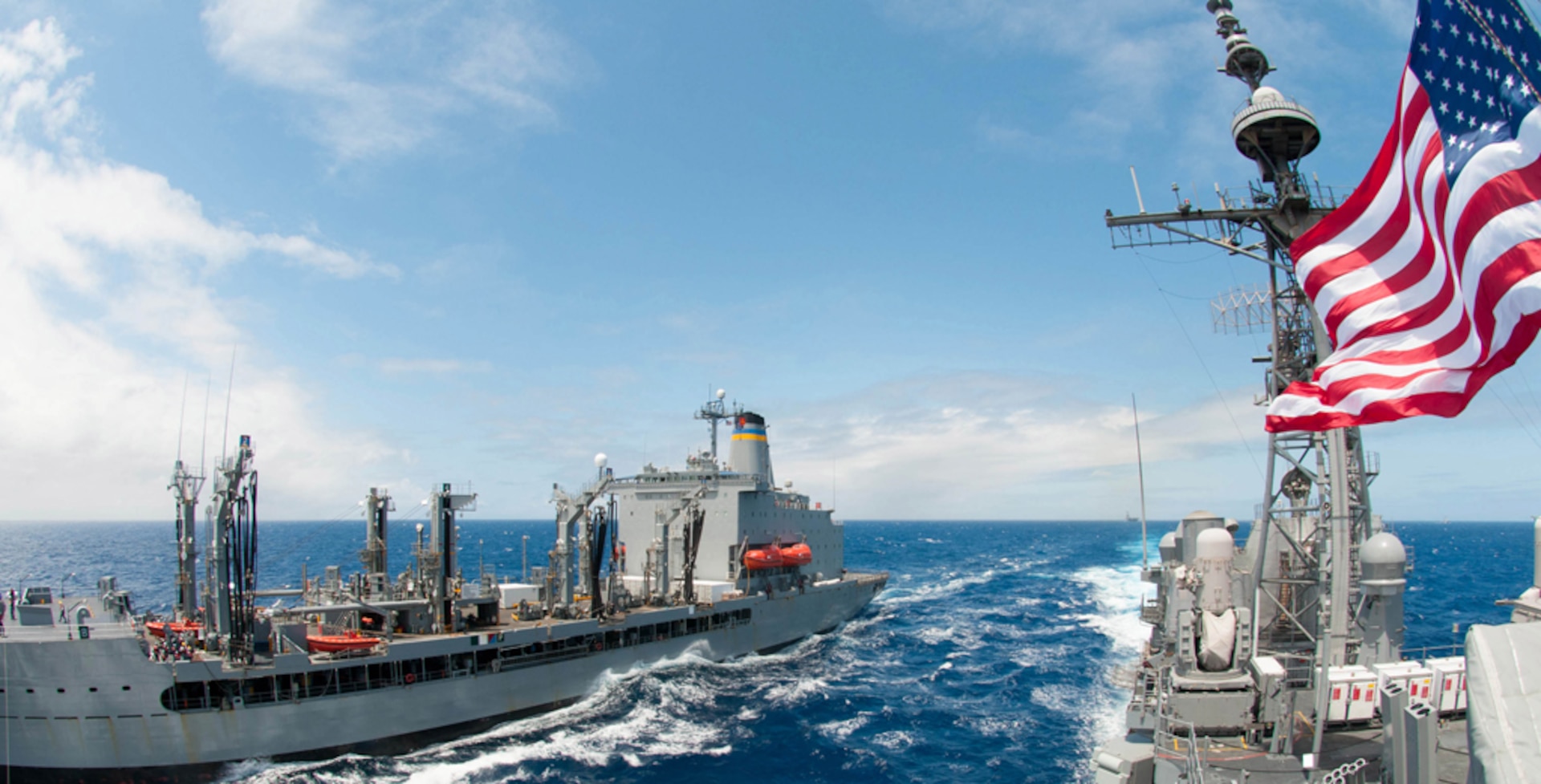 Official U.S. Navy file photo of guided-missile cruiser USS Princeton (CG 59) pulling alongside the military sealift command fleet replenishment oiler USNS Henry J. Kaiser (T-AO 187) to refuel at sea with biofuel during The Great Green Fleet demonstration portion of the Rim of the Pacific (RIMPAC) 2012 exercise. Princeton took on a 50-50 blend of advanced biofuel and traditional petroleum-based fuel. 