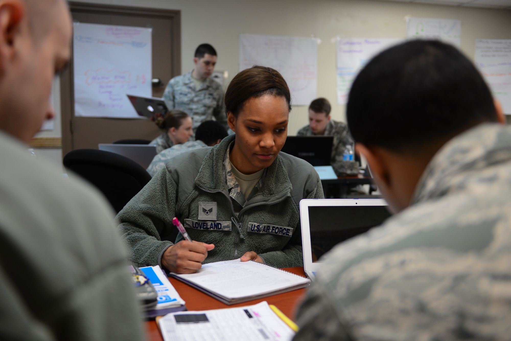 Senior Airman Miracle Loveland, 36th Fighter Squadron intelligence analyst, works on a negotiation style scenario to identify lesson concepts during Airman Leadership School March 20, 2015, at Osan Air Base Republic of Korea. Loveland is this week’s Airman Spotlight winner. (U.S. Air Force photo by Senior Airman David Owsianka)